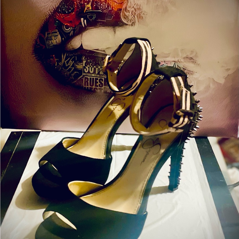 Elegant Black Stiletto Heels with Ankle Detail